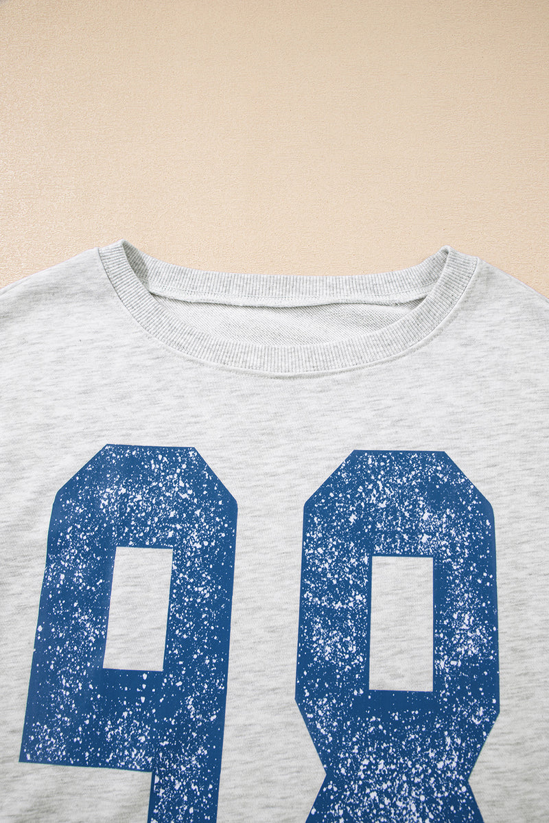 Faded Varsity Print Loose Pullover Top