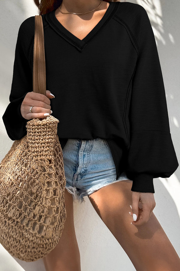 Solid Exposed Seam Textured Knit V Neck Pullover Top
