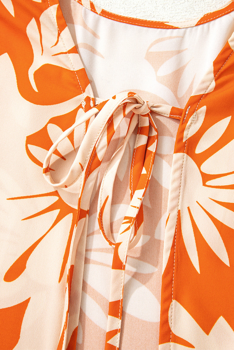 Floral Print Knotted Open Back Long Sleeve Blouse