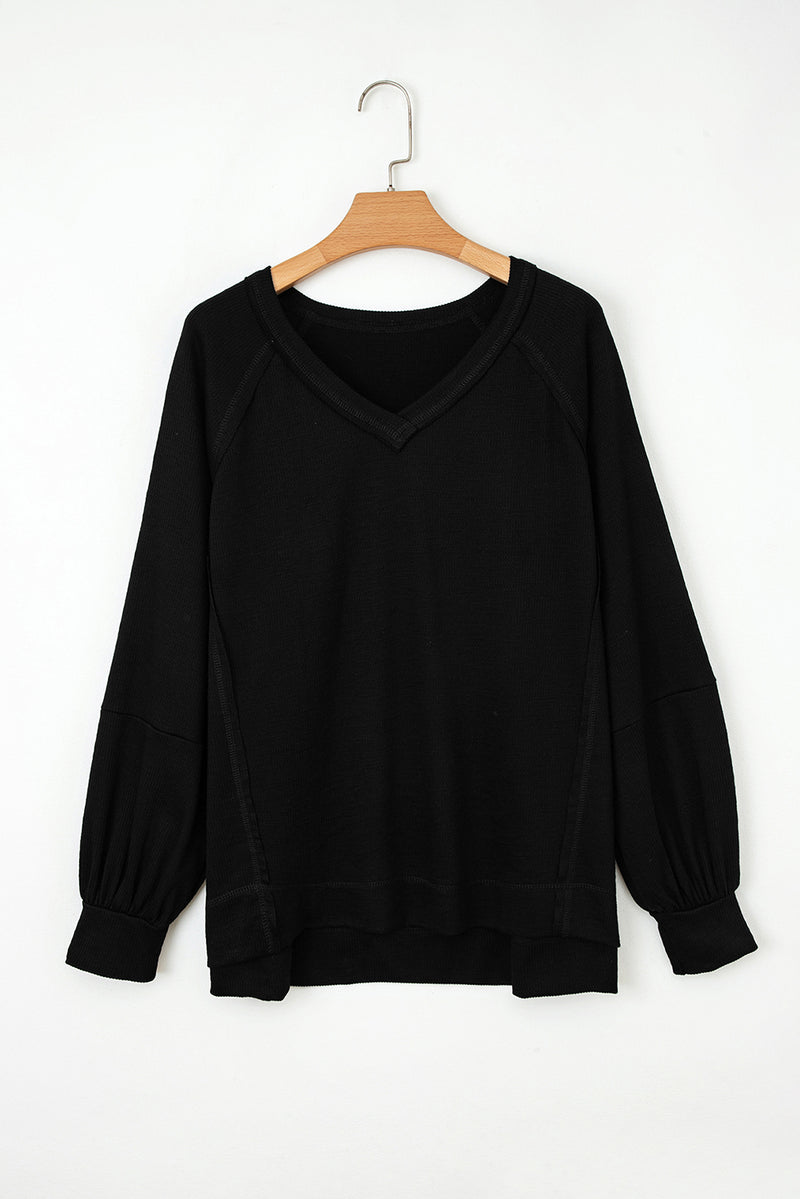 Solid Exposed Seam Textured Knit V Neck Pullover Top