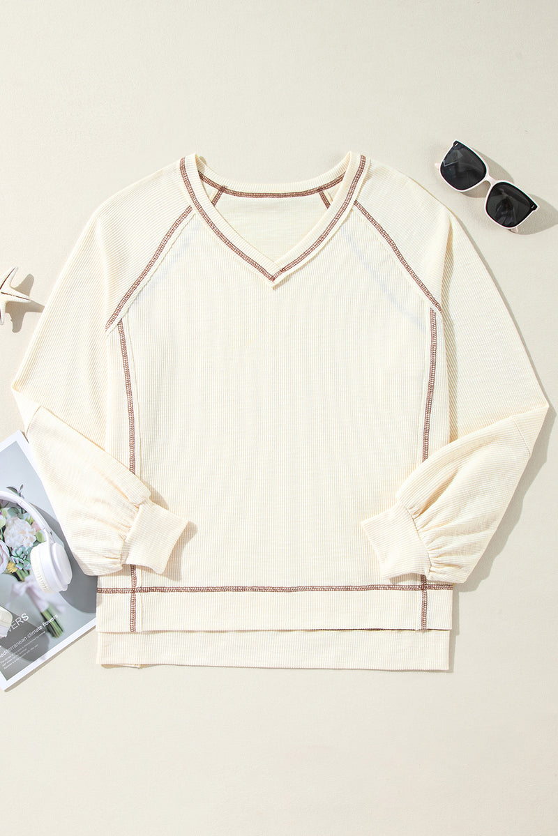 Solid Exposed Seam Textured Knit V Neck Pullover Top