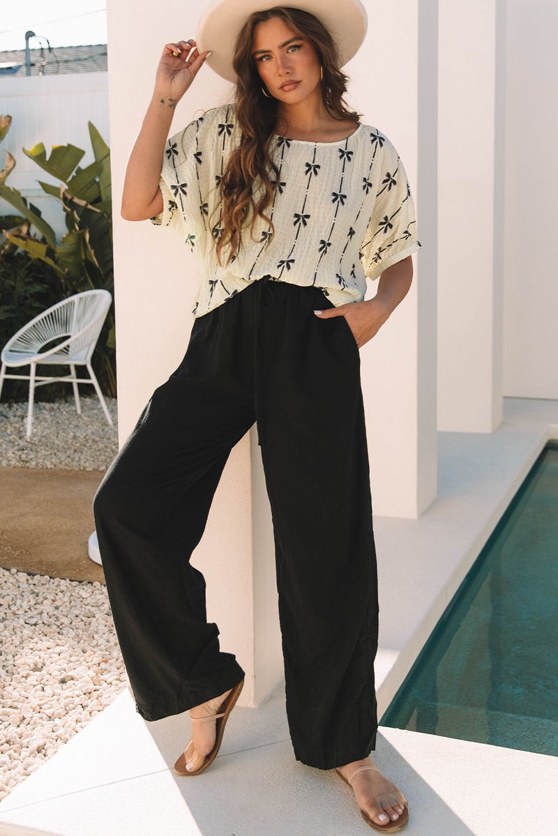 Flowy and Comfortable Bow Print Puff Short Sleeve Top