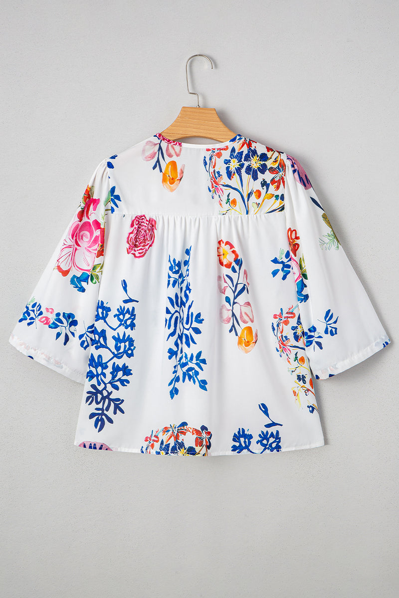 Floral Print Tassel Tie Bracelet Sleeve Flowy Blouse