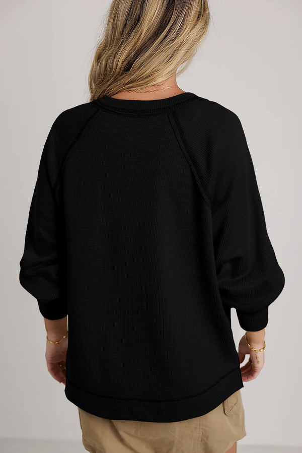 Solid Exposed Seam Textured Knit V Neck Pullover Top