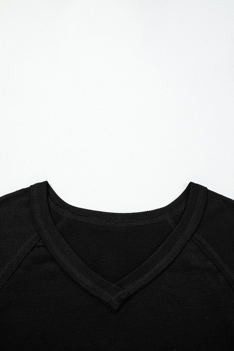 Solid Exposed Seam Textured Knit V Neck Pullover Top